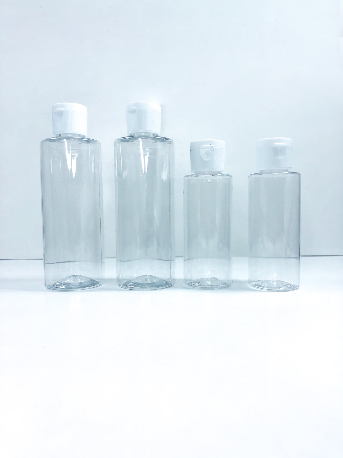Botella PET transparente 4oz / 2 oz